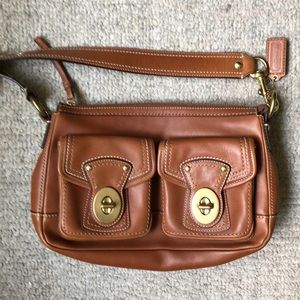 Coach shoulder bag with front flap pockets